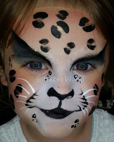 Leopard face painted  by Hazel