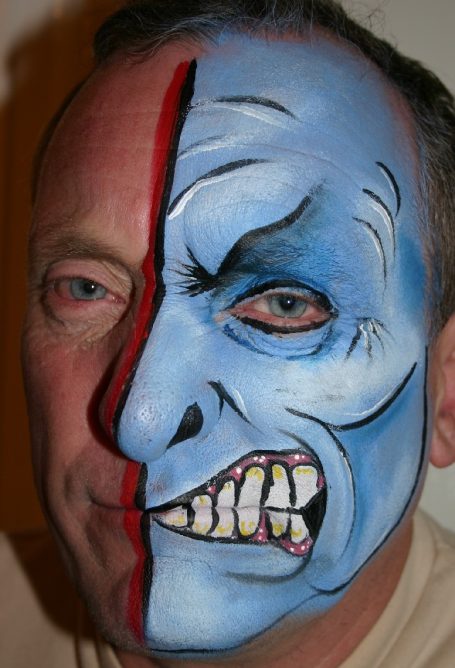 Half and half face painted by Hazel