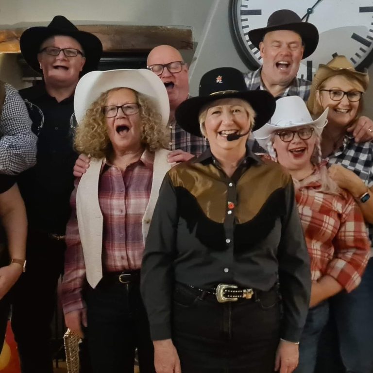 Group photo at a Wild West themed event