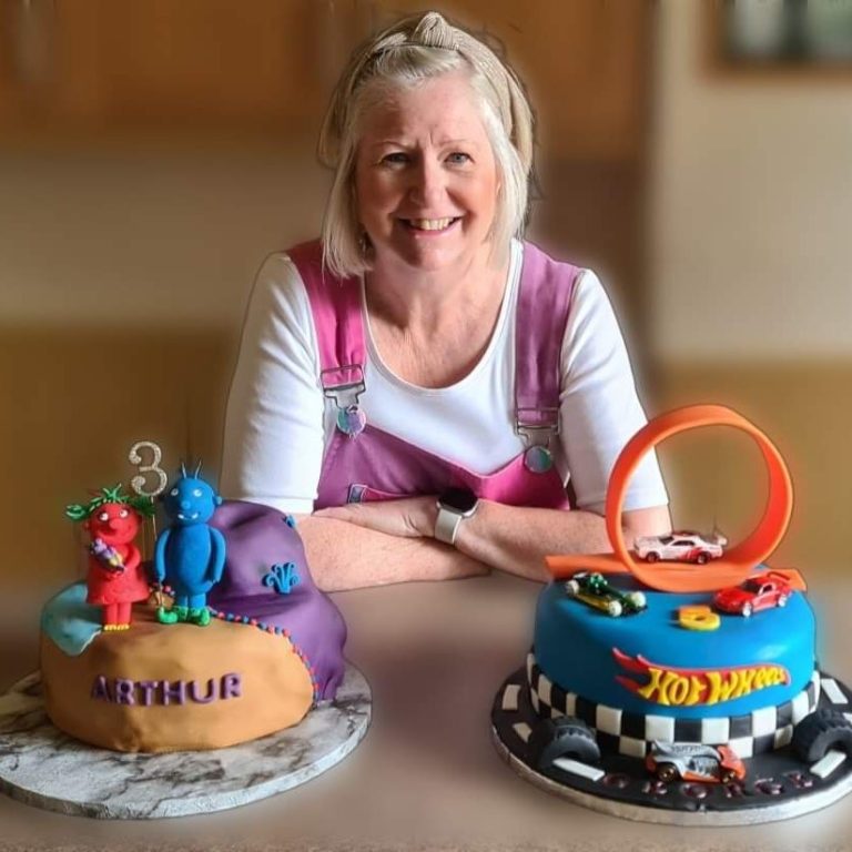 Hazel with some of her cake toppers