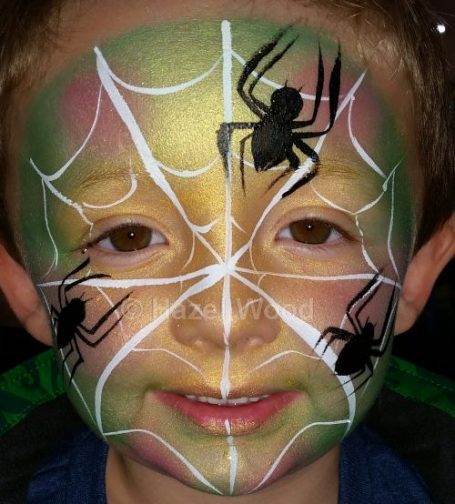 Spider face painted by Hazel