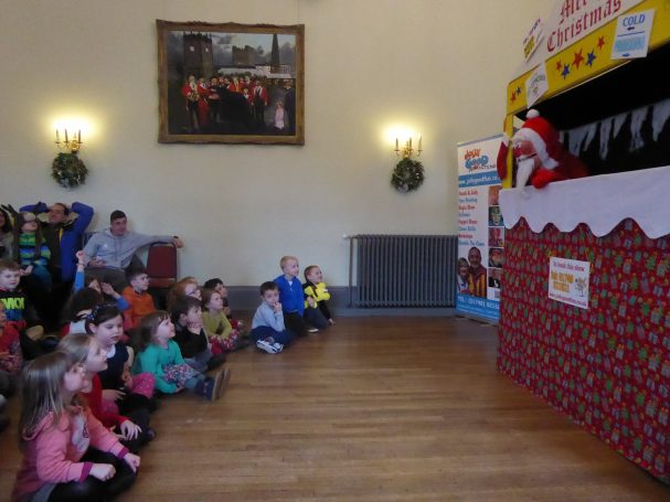 Santa talking to the children