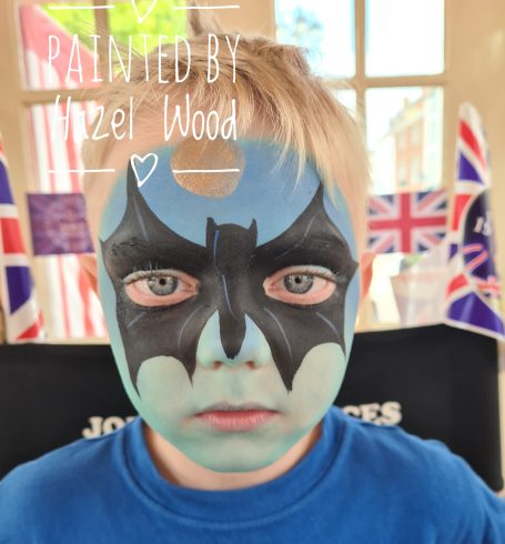 Batman face painted by Hazel