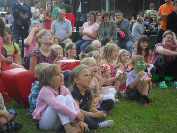 Children watching Punch and Judy