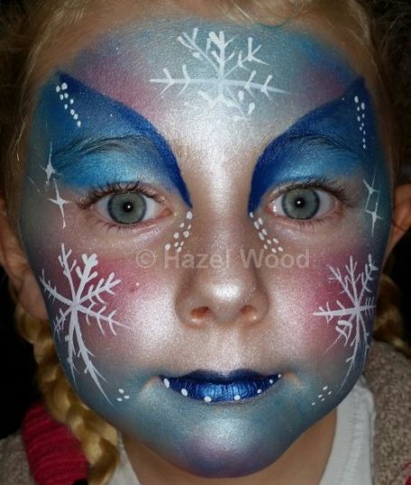 Snowflake face painted by Hazel