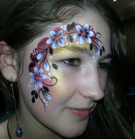 Flower face painted by Hazel