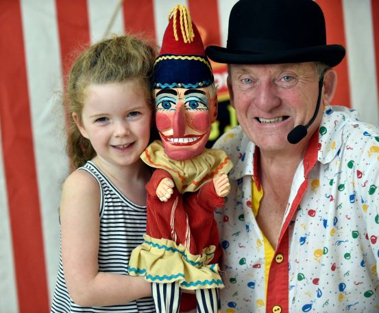 Girl holding Mr Punch