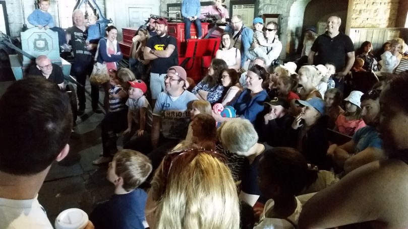 Audience enjoying the Punch and Judy Show