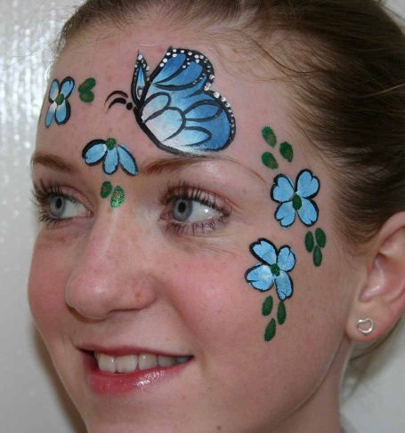 Butterfly and flowers face painted by Hazel